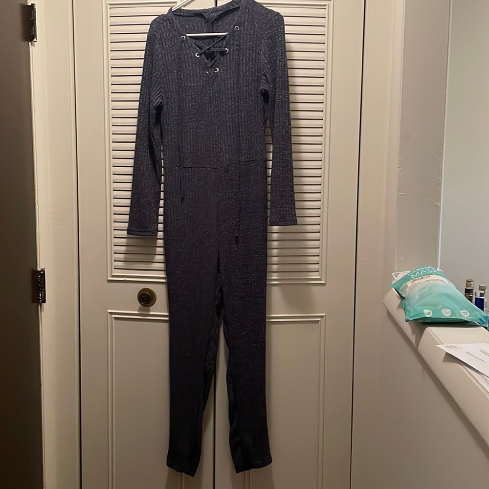 Dark gray jumpsuit in tall 2x. I believe the brand to be fashionova but no tag
